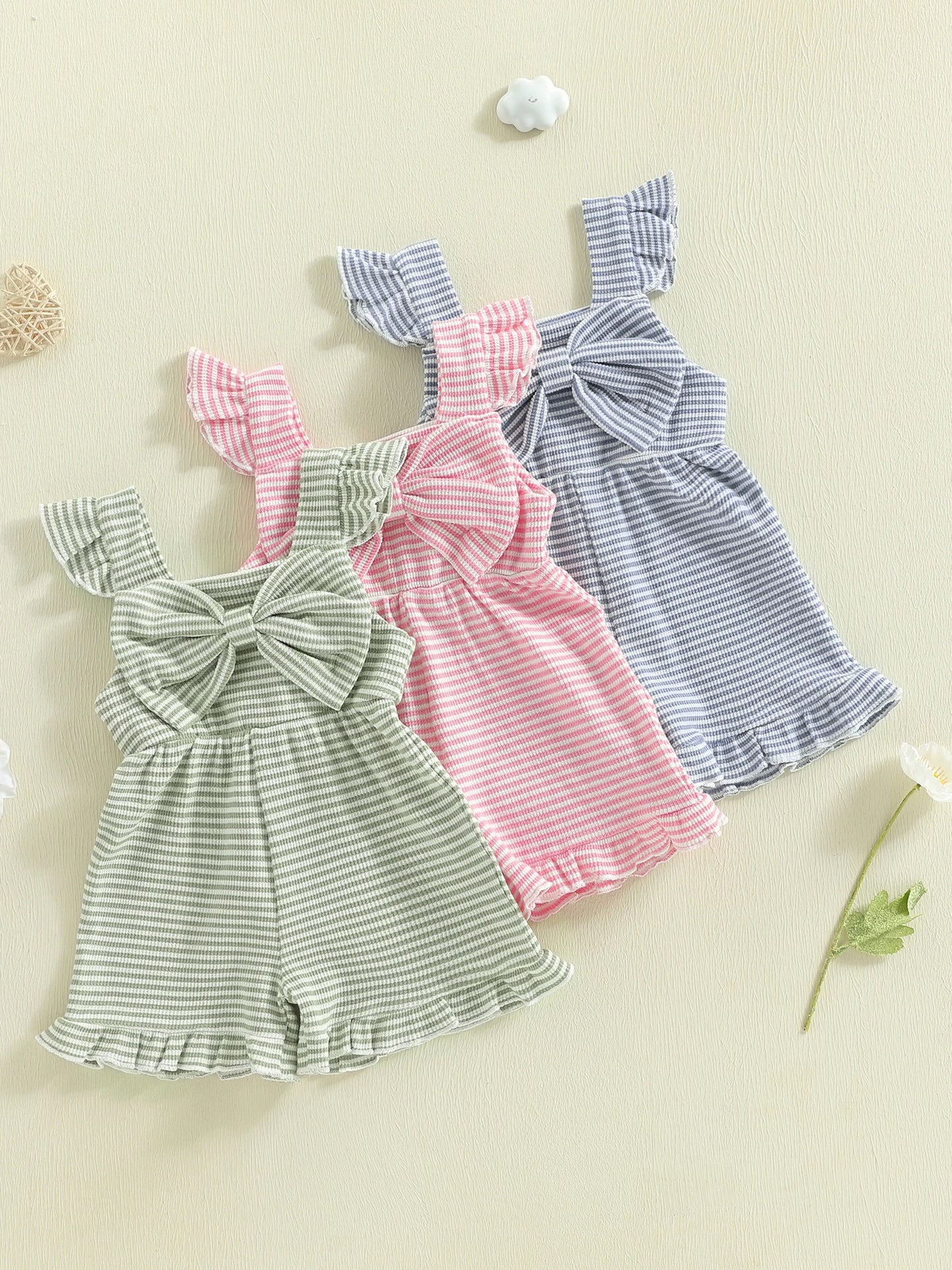 Adorable Infant Girls Striped Romper with Sleeveless Design Ruffle Detail and Bow Accent for a Stylish Look